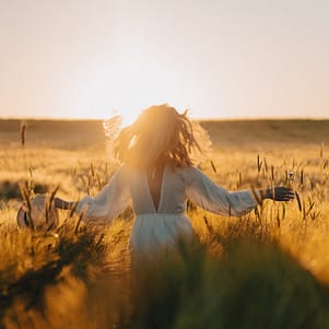 young-beautiful-woman-with-long-blond-hair-white-dress-wheat-field-early-morning-sunrise-summer-is-time-dreamers-flying-hair-woman-running-across-field-rays-scaled